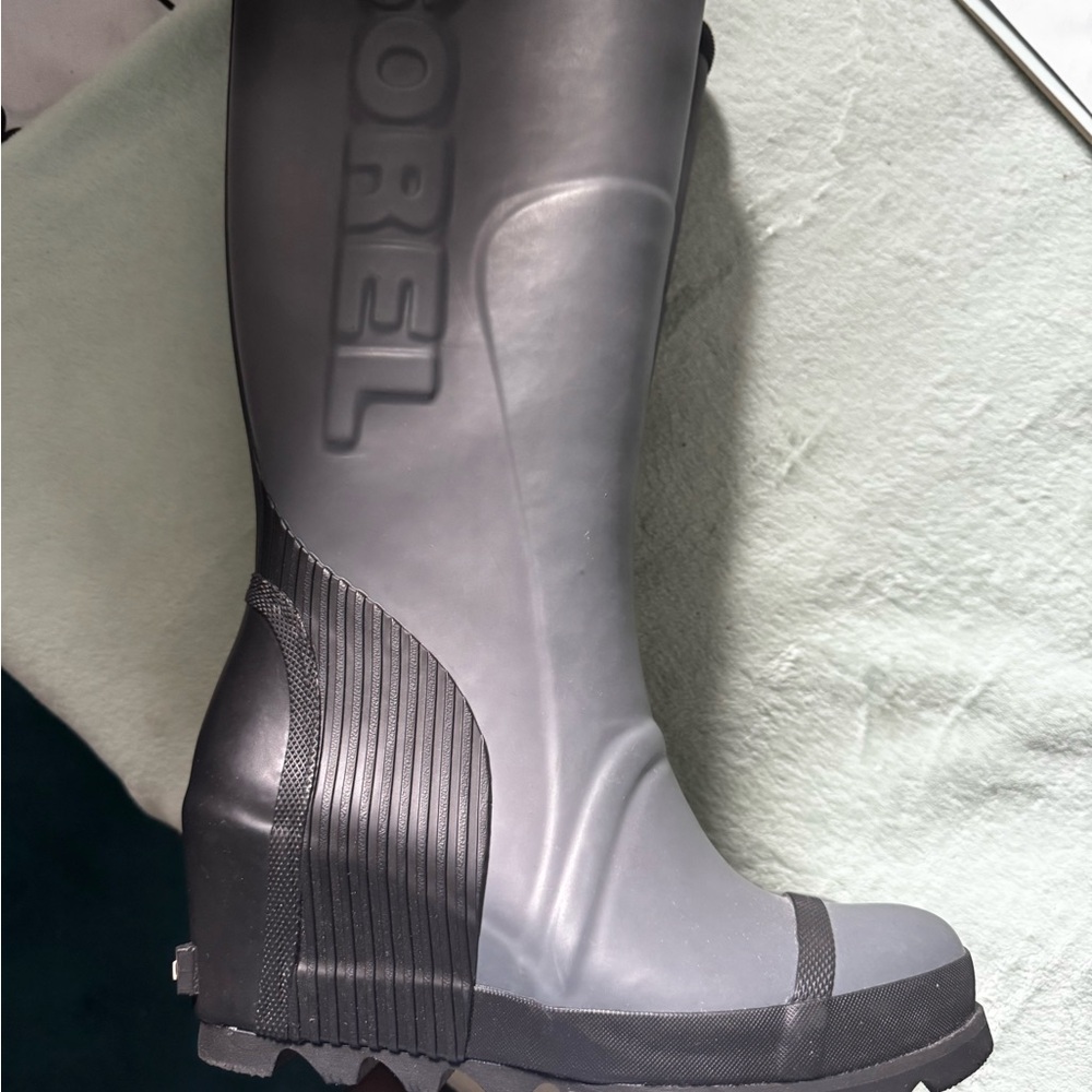 Grey SOREL rain boots with heel